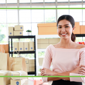Business owner being happy while growing her online sales